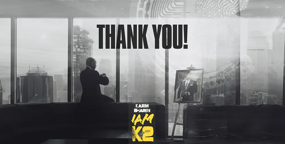 Thank you banner: Karim Gharbi looking over a city skyline, with the I AM K2 logo